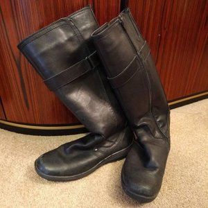 Tall black winter boots, with side zipper